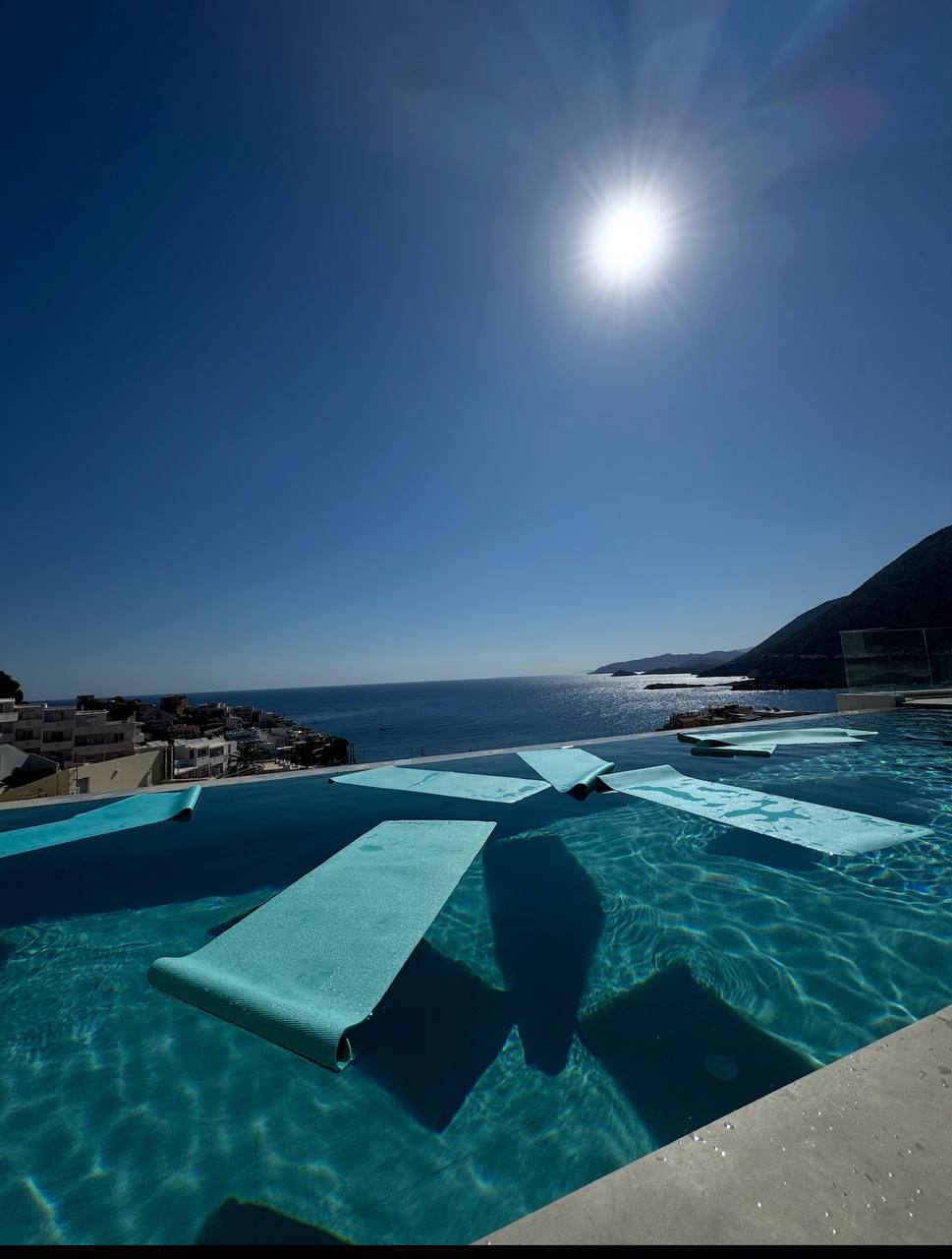 Crete infinity pool overlooking the water